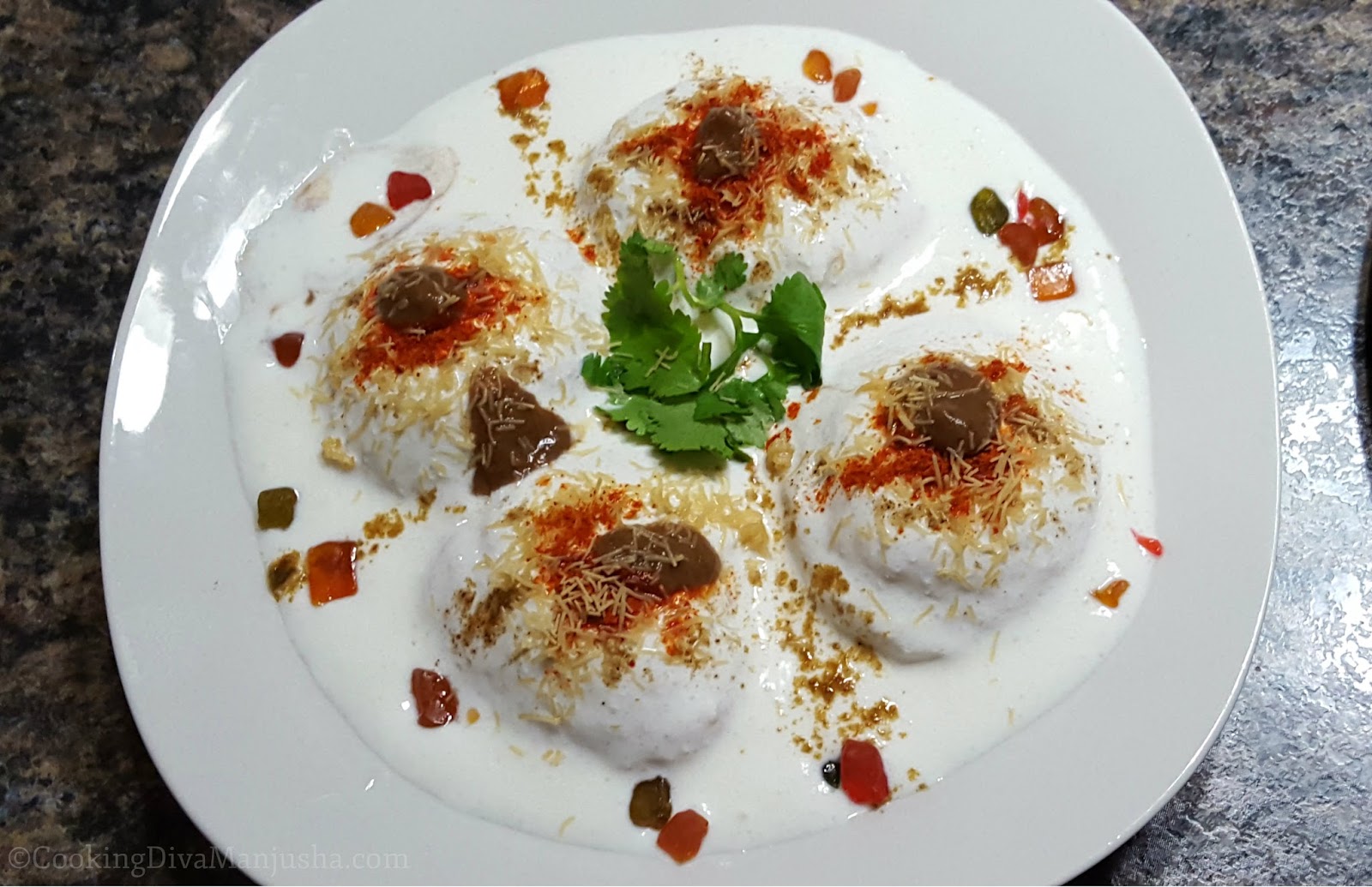 dahi bhalla in white plate